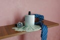 Clock dollars necktie and bottle of perfume on the shelf Royalty Free Stock Photo