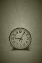 A very simple round black and white clock against empty background Royalty Free Stock Photo