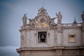 Clock on the Facade of the Basilic of Saint Peter in the Vatican City in the Centre of Rome Royalty Free Stock Photo