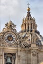 Clock on facade of Saint Peter basilica in Rome Royalty Free Stock Photo