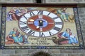 Clock face with the four evangelists, Black Church, Brasov, Romania Royalty Free Stock Photo