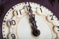 Clock face of old clock with worn numbers and arrows Royalty Free Stock Photo