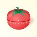 Clock in the form of a red tomato. Timer for productive work. Royalty Free Stock Photo