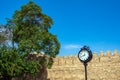 Clock at the fortress wall in Governor Garden in Baku city, Royalty Free Stock Photo