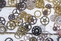 Clock gear wheels on table. Retro clock repairing abstract photo Royalty Free Stock Photo