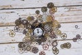 Clock gear wheels on table. Retro clock repairing abstract photo Royalty Free Stock Photo