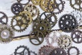 Clock gear wheels on table. Retro clock repairing abstract photo Royalty Free Stock Photo