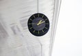Clock Hanging From Ceiling in Building Royalty Free Stock Photo