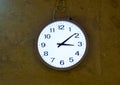 The clock is hung on the wall. Royalty Free Stock Photo