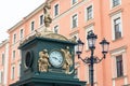 Clock and lamp in streets of St. Petersburg, Russia