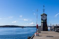 Clock located at the Aker Brygge pier on a beautiful, sunny day