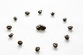 Clock made from coffee beans on white background, love coffee