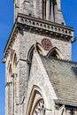 Clock old english church in spring Royalty Free Stock Photo