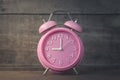 Clock Pink on wooden