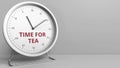 Clock with revealing TIME FOR TEA caption. Conceptual 3D rendering