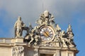 Clock with sculptures at Saint Peter basilica in Vatican Royalty Free Stock Photo