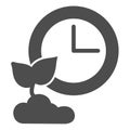 Clock and sprout in soil, growing time solid icon, gardening concept, time of growth vector sign on white background