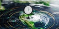 A clock stands on a globe showing a hurricane with circular data lines around it in a futuristic setting Royalty Free Stock Photo