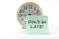 Clock with sticker Don`t be late. General concept Royalty Free Stock Photo