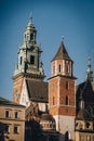 Clock on stone medieval tower of Wawel Royal Castle, Krakow, Poland Royalty Free Stock Photo