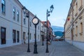 Clock on a street in the old town of Baia Mare, Romania Royalty Free Stock Photo