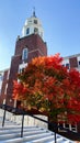Clock tower on brick Pulliam Hall building with autumn maple tree in Carbondale Illinois campus Royalty Free Stock Photo