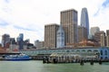 Clock tower of Ferry Building and financial center downtown Royalty Free Stock Photo