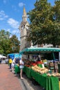 Clock tower and fruit and vegetable stall