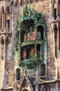 Clock Tower or Glockenspiel closeup, section of bell play, Munich, Germany. Detail of Rathaus New Town Hall with chime Royalty Free Stock Photo