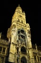 Clock Tower of the gothic New Town Hall, illuminated at night, Munich, Germany Royalty Free Stock Photo