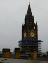 The clock tower of Manchester town hall with scaffolding