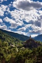 The clock tower of Meolans Revel village in summer. Alpes-de-Haute-Provence, Alps, France Royalty Free Stock Photo