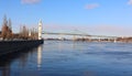 Clock tower in old port and Jacques Cartier bridge Royalty Free Stock Photo