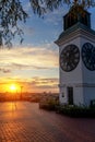 Clock tower in the Petrovaradin fortress at sunset, travel Balkan countries Royalty Free Stock Photo