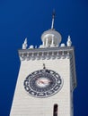 The clock tower of Sochi railway station on a background of blue sky Royalty Free Stock Photo