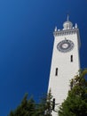 The clock tower of Sochi railway station on a background of blue sky Royalty Free Stock Photo