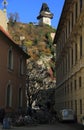 Clock tower and some other buildings in Graz Royalty Free Stock Photo