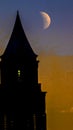 Clock Tower at Sunrise with Moon Royalty Free Stock Photo