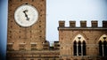 Clock tower Torre del Mangia on Piazza del Campo in Siena, Tuscany, Italy Royalty Free Stock Photo