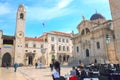 Clock Tower and Vlaho Church in Luza Square in Dubrovnik, Croat