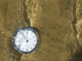 Clock under water. Royalty Free Stock Photo