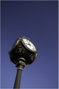 Urban Clock on a blue background Royalty Free Stock Photo