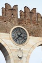 Clock on the wall of Portoni della Bra in Verona, Italy