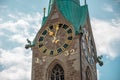 Clock wall on the tower of the ancient building in the city center of Zurich, Switzerland. Fraumunster church.