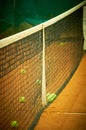 The clock weighs on the tennis court over the net, sports Royalty Free Stock Photo