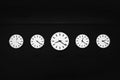 Five Clocks of Different Times Royalty Free Stock Photo