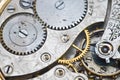 Clockwork, gears in an old watch. Teamwork concept, idea, technology, eternity, business. Macro