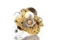 Clockworks mechanism of old vintage watch on white background wi