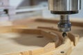 close up Router CNC machine carving a piece of wood in the workshop Royalty Free Stock Photo