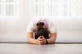 Cloese up hand.Asian woman working out in sportswear while doing yoga, seated in Child exercise, Balasana stance Royalty Free Stock Photo